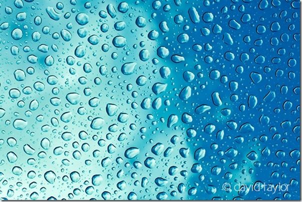 Water droplets on a window looking up at a blue sky, Buying a new camera, questions to to ask, what size sensor