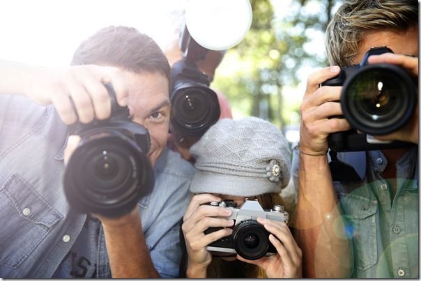 Group of paparazzi people taking picture