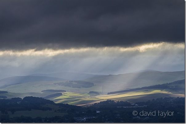 Stormy light over Melrose and the Tweed valley in the Scottish Borders, Scotland, hiking safety, hiking essentials, hiking safety tips, what to wear hiking, navigational aids, landmarks, Warm, cold, weather, climate, snow, heat, exhastion