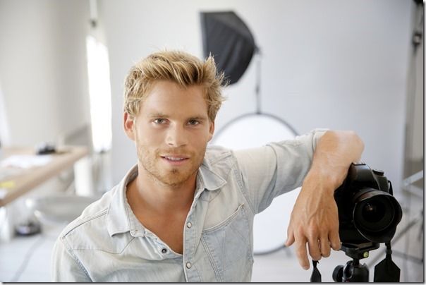 Photographer standing in photo studio