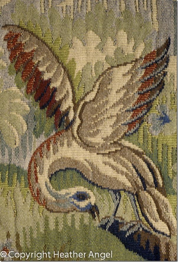 Bird on replica of C18 French tapestry by d' Aubusson