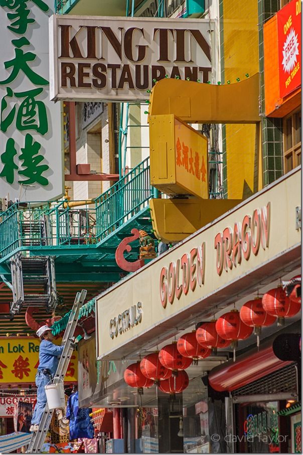 Repairing the neon signs above the streets of Chinatown, San Fra, Travel Photography Tips, Travel Photography, Holiday photography, online photography courses,