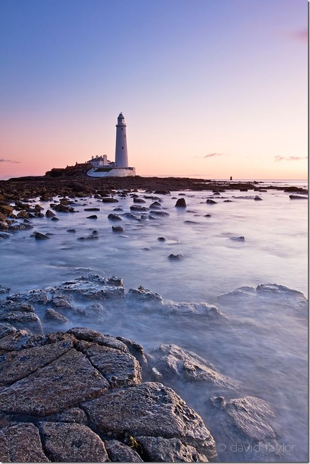 St. Mary's Lighthouse on the Northumbrian coast near the town of Whitley Bay, England. The lighthouse was completed in 1898 and remained in operation until 1984. Reaching the island, on which the lighthouse sits, is possible across a causeway only during low tide