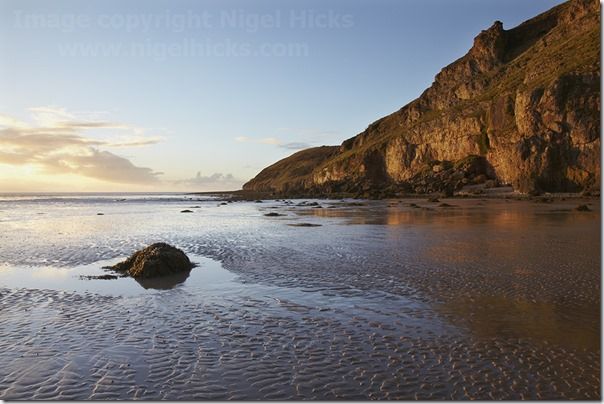 The cliffs of Brean Down, seen from Brean beach, Somerset, Great Britain.