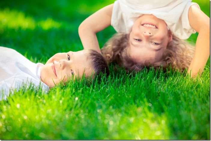 Happy children standing upside down