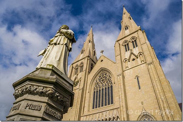 The facade of St Patrick's Roman Catholic cathedral in Armagh, County Armagh, Northern Ireland. The statue is the Archbishop William Crolly who laid the foundation stone in 1840