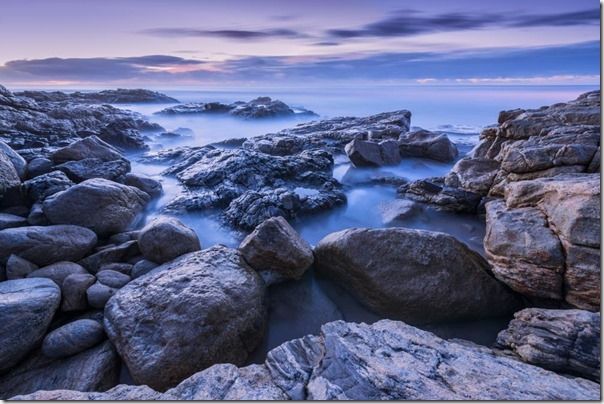 Misty waves crashing on the rocks in South Africa