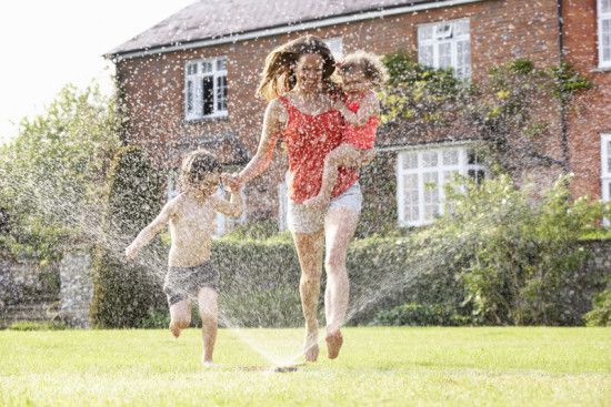 Children with Sprinkler