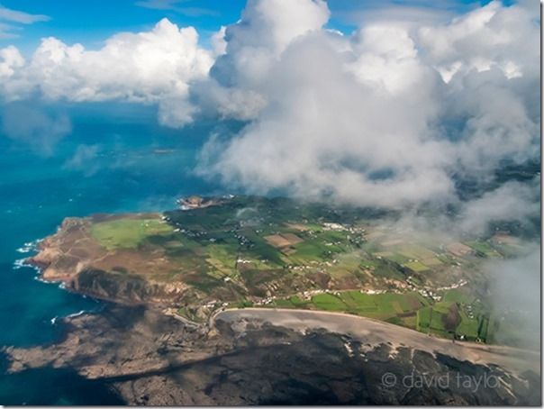 The south-western corner of Jersey seen from a commercial flight back to England, What’s The Differences Between a Compact and a DSLR Camera?, DSLR. Compact, system camera, 