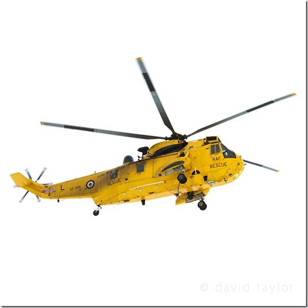 Westland Sea-King helicopter of the Royal Air Force Air-Sea Rescue service flying across an overcast sky, England, Shutter Speed, fast Shutter speed, freezing action, Hand held, Camera Shake, Panning, 