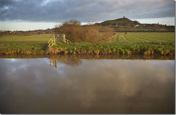 The River Brue flowing through countryside near Glastonbury, Glastonbury Tor in the background, Somerset, Great Britain., How to Publish a Photography Calendar, How to publish a calendar, Printing, selling, photography, landscape